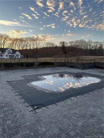 a view of swimming pool with an ocean view