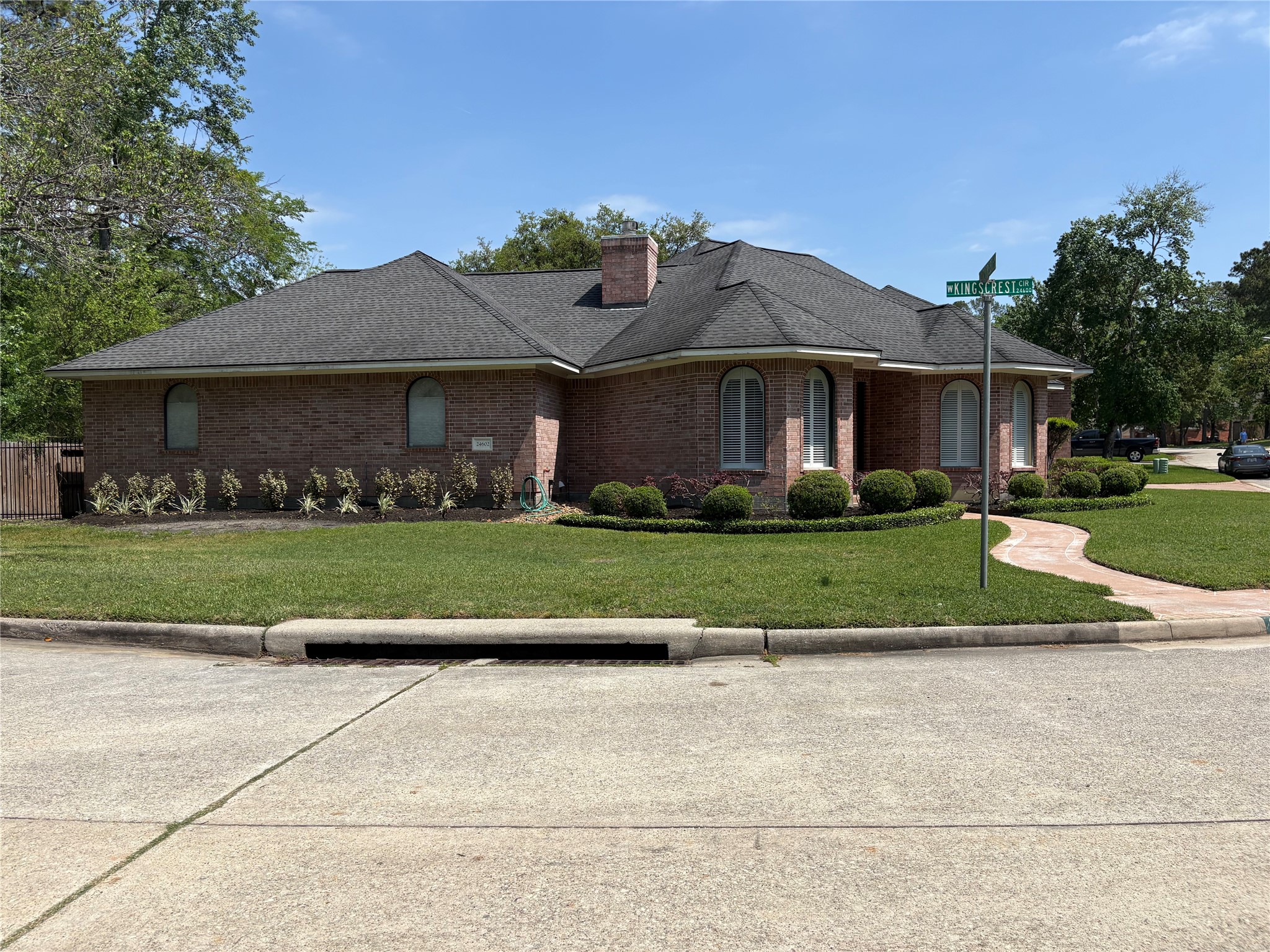 24602 West Kingscrest Circle Spring, TX 77389 - Photo 15 of 15 front view of a house with a yard