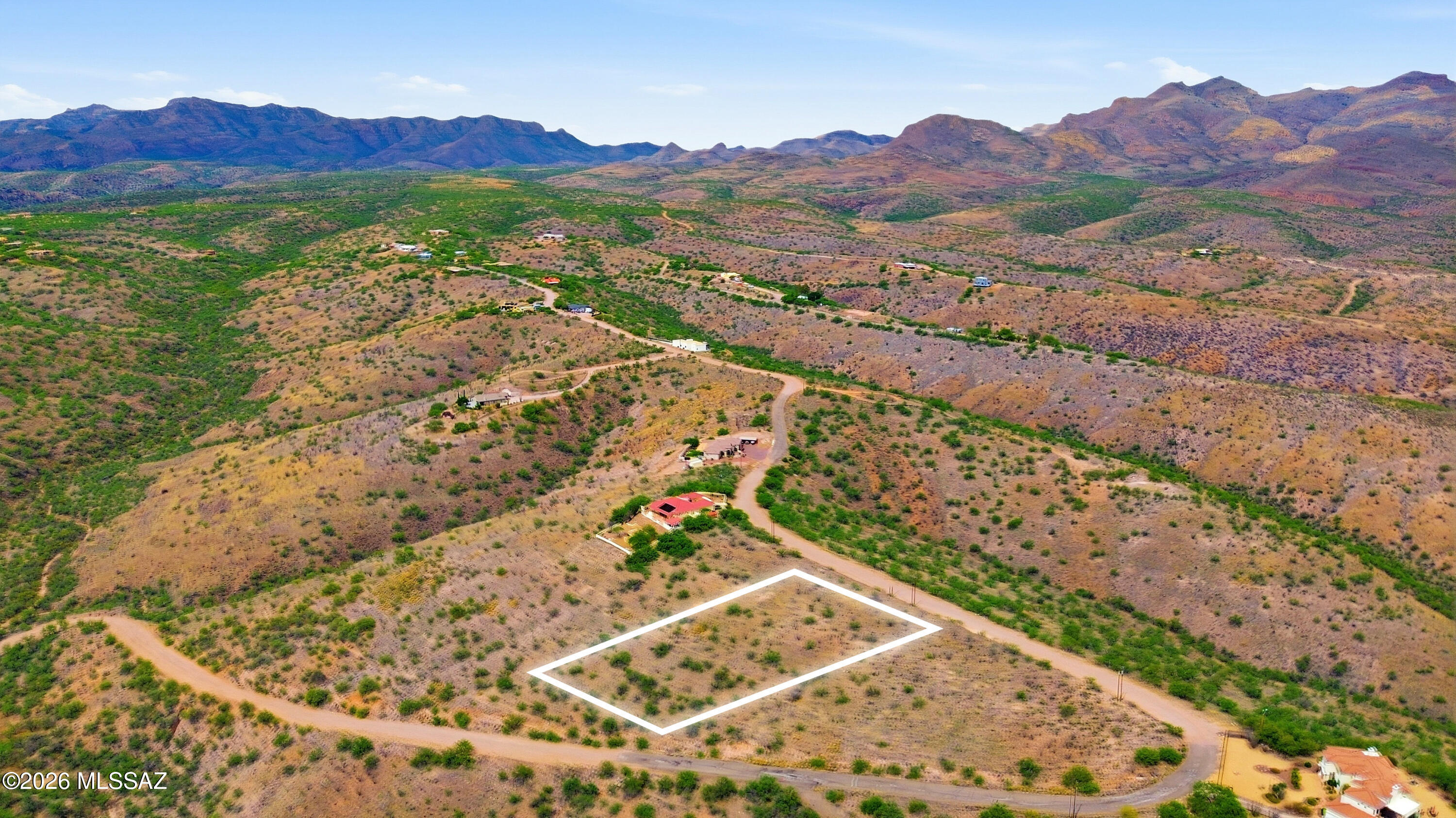 1525 Circulo Jacona, Unit 32 Rio Rico, AZ 85648 - Photo 9 of 13 a view of a mountain with a mountain and a lake