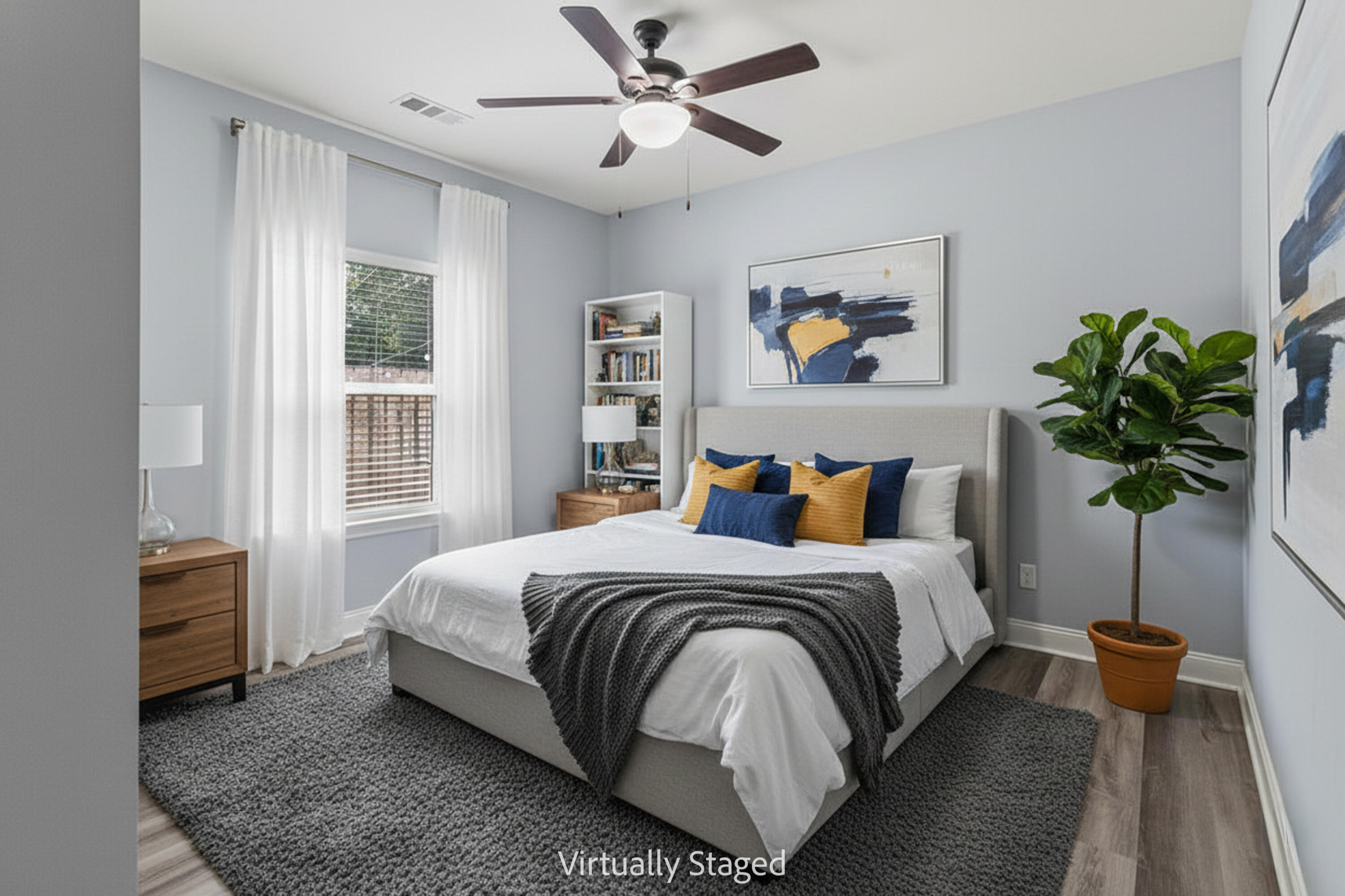 57 5th Street Shalimar, FL 32579 - Photo 12 of 30 a bedroom with bed and a potted plant