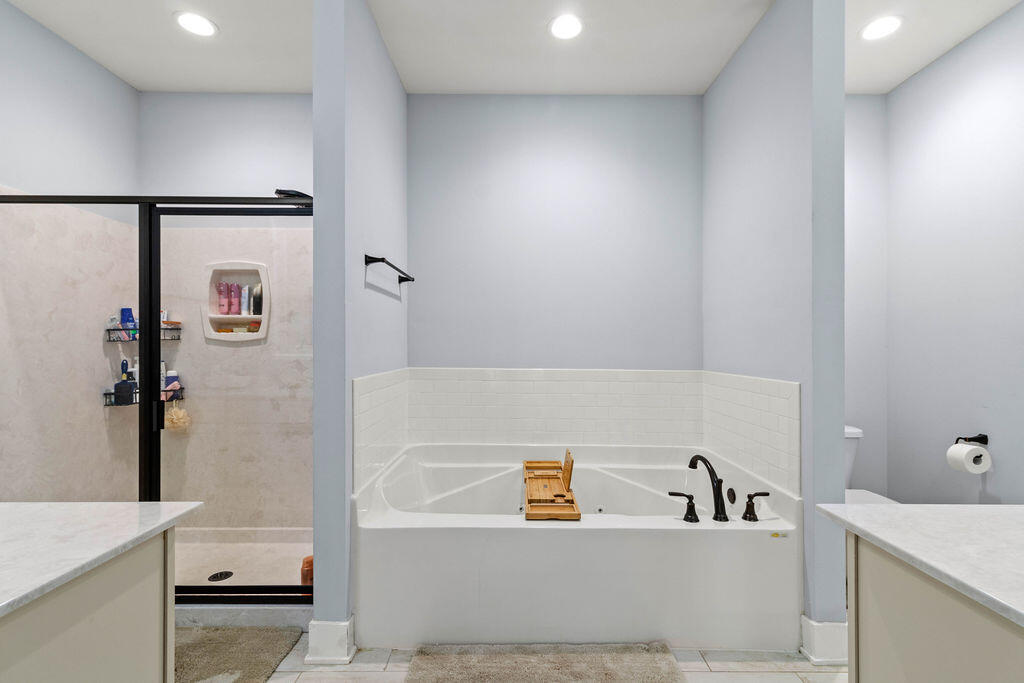 57 5th Street Shalimar, FL 32579 - Photo 21 of 30 a bathroom with a bathtub and a sink