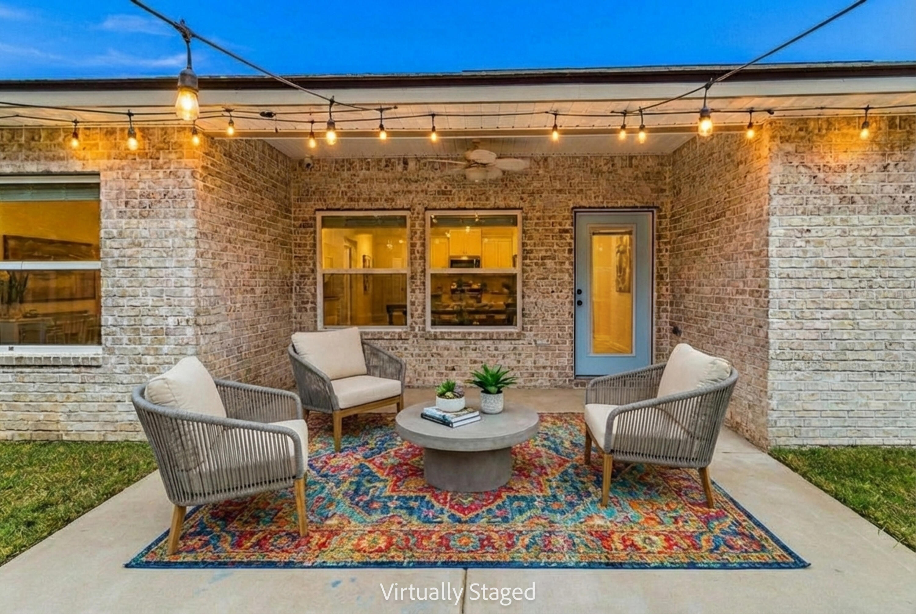 57 5th Street Shalimar, FL 32579 - Photo 4 of 31 a view of a patio with a table and chairs potted plants