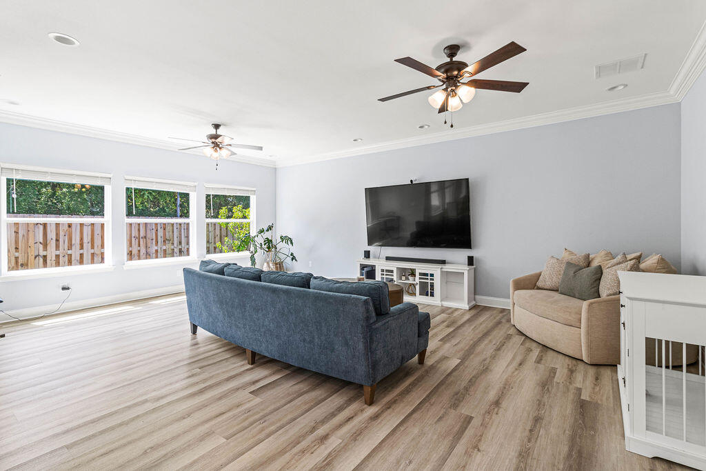 57 5th Street Shalimar, FL 32579 - Photo 10 of 31 a living room with furniture and a flat screen tv