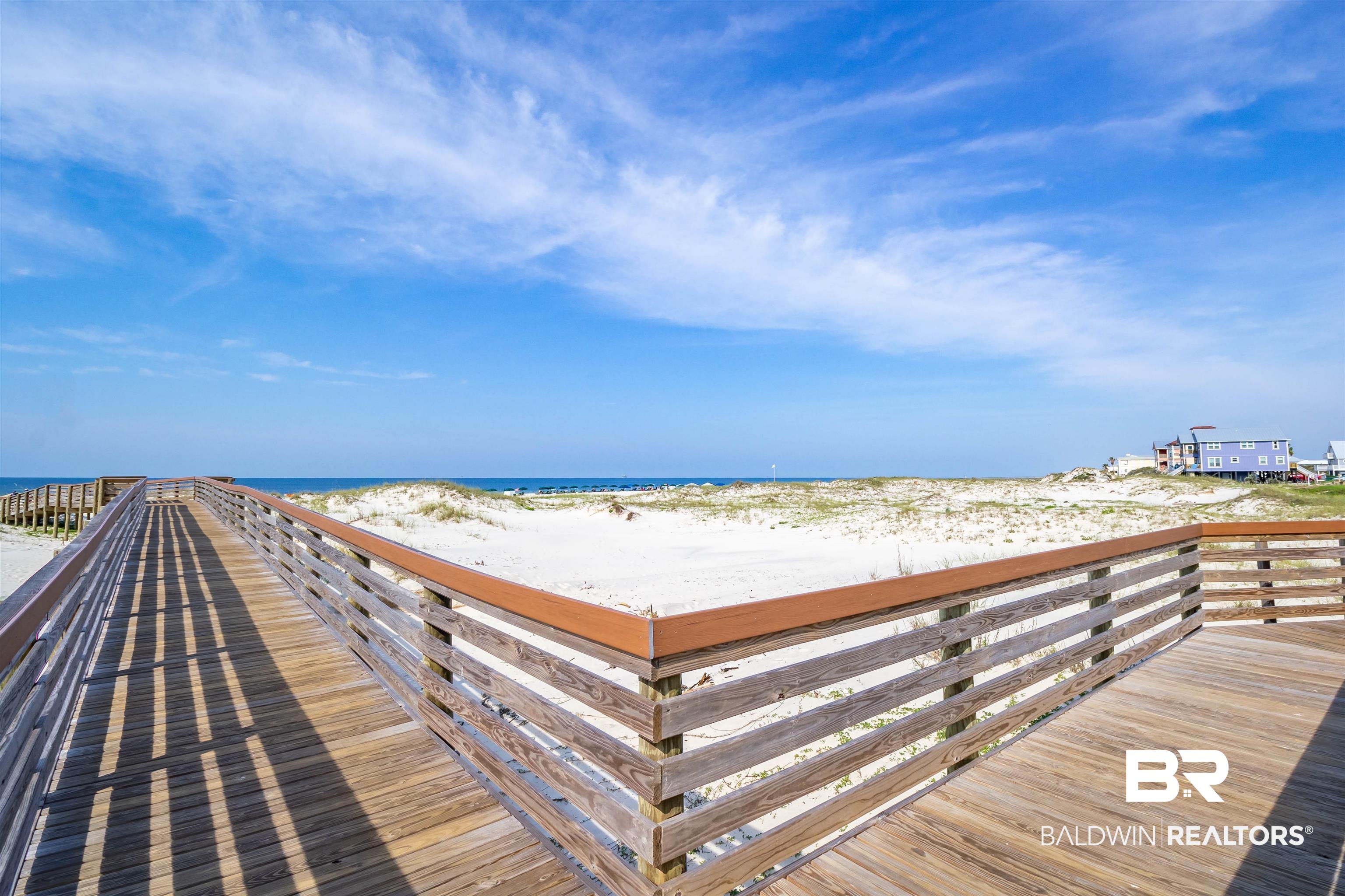 375 Plantation Road, Unit 5514 Gulf Shores, AL 36542 - Photo 7 of 44 Dock area with view of water and beach