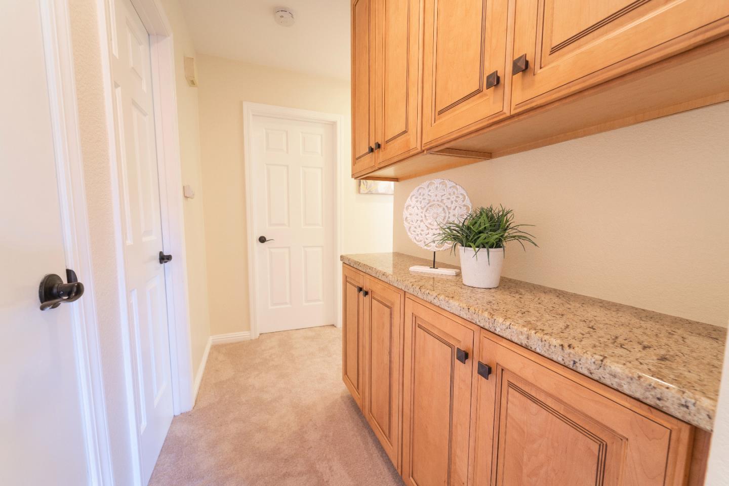 808 Hamilton Avenue Milpitas, CA 95035 - Photo 13 of 41 a kitchen with stainless steel appliances granite countertop a sink and dishwasher with wooden floor