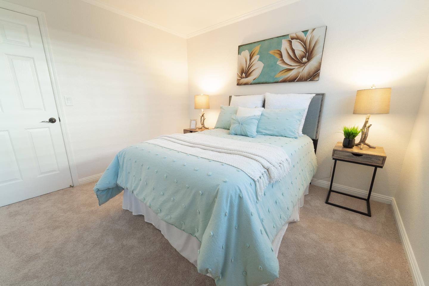 808 Hamilton Avenue Milpitas, CA 95035 - Photo 20 of 41 a bedroom with a bed and lamps