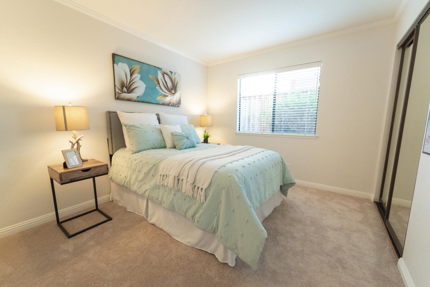 808 Hamilton Avenue Milpitas, CA 95035 - Photo 21 of 41 a bed sitting in a bedroom next to a window
