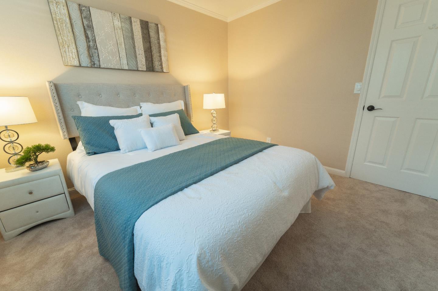 808 Hamilton Avenue Milpitas, CA 95035 - Photo 24 of 41 a bedroom with a bed and a painting on the wall