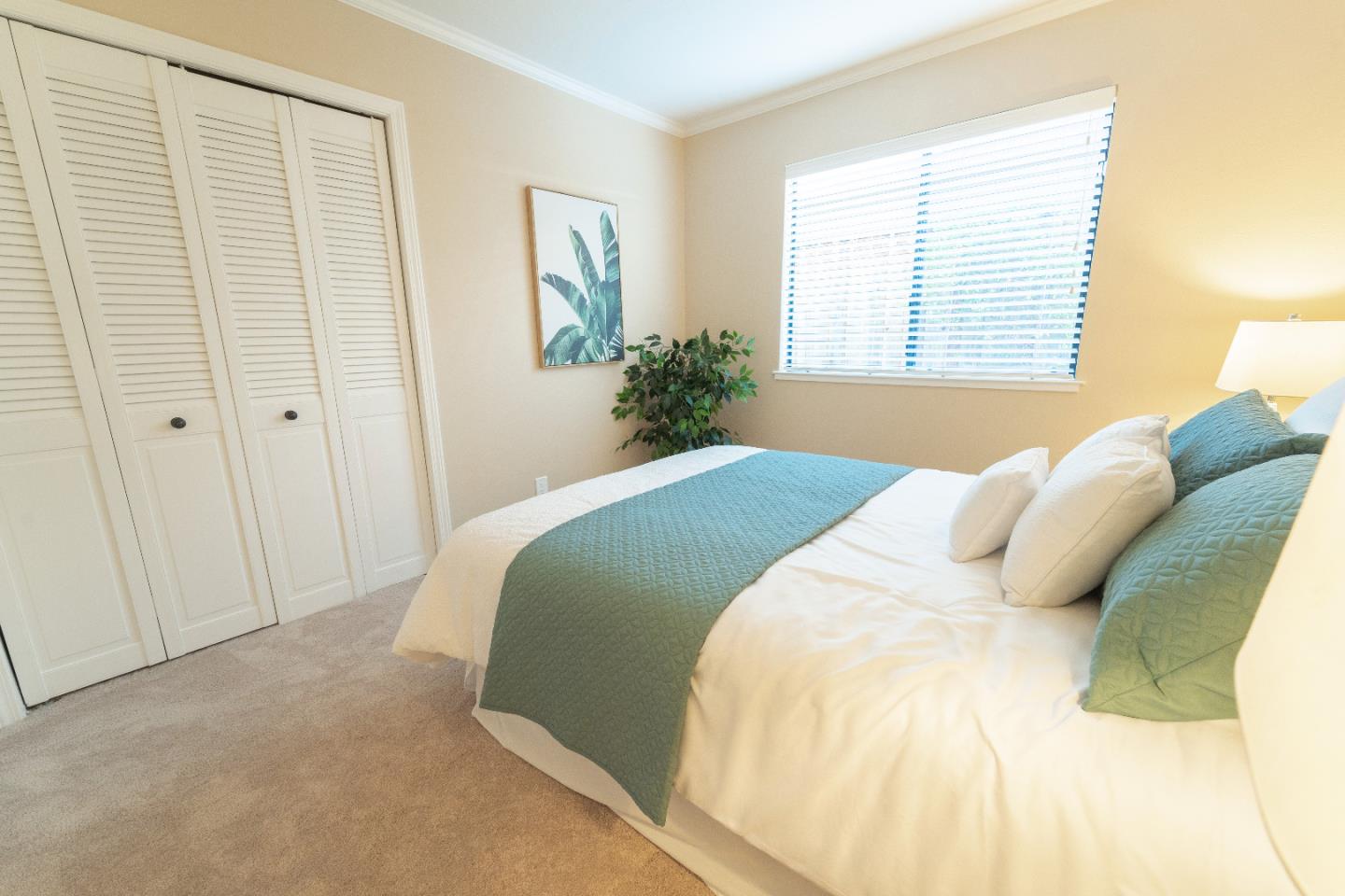808 Hamilton Avenue Milpitas, CA 95035 - Photo 25 of 41 a bedroom with a bed and a window
