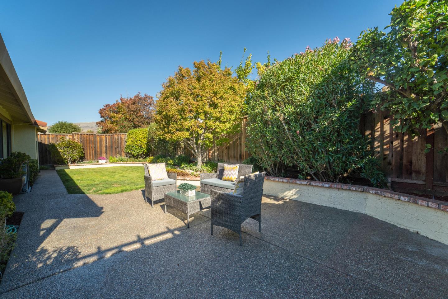 808 Hamilton Avenue Milpitas, CA 95035 - Photo 30 of 41 a view of a patio with a table and chairs