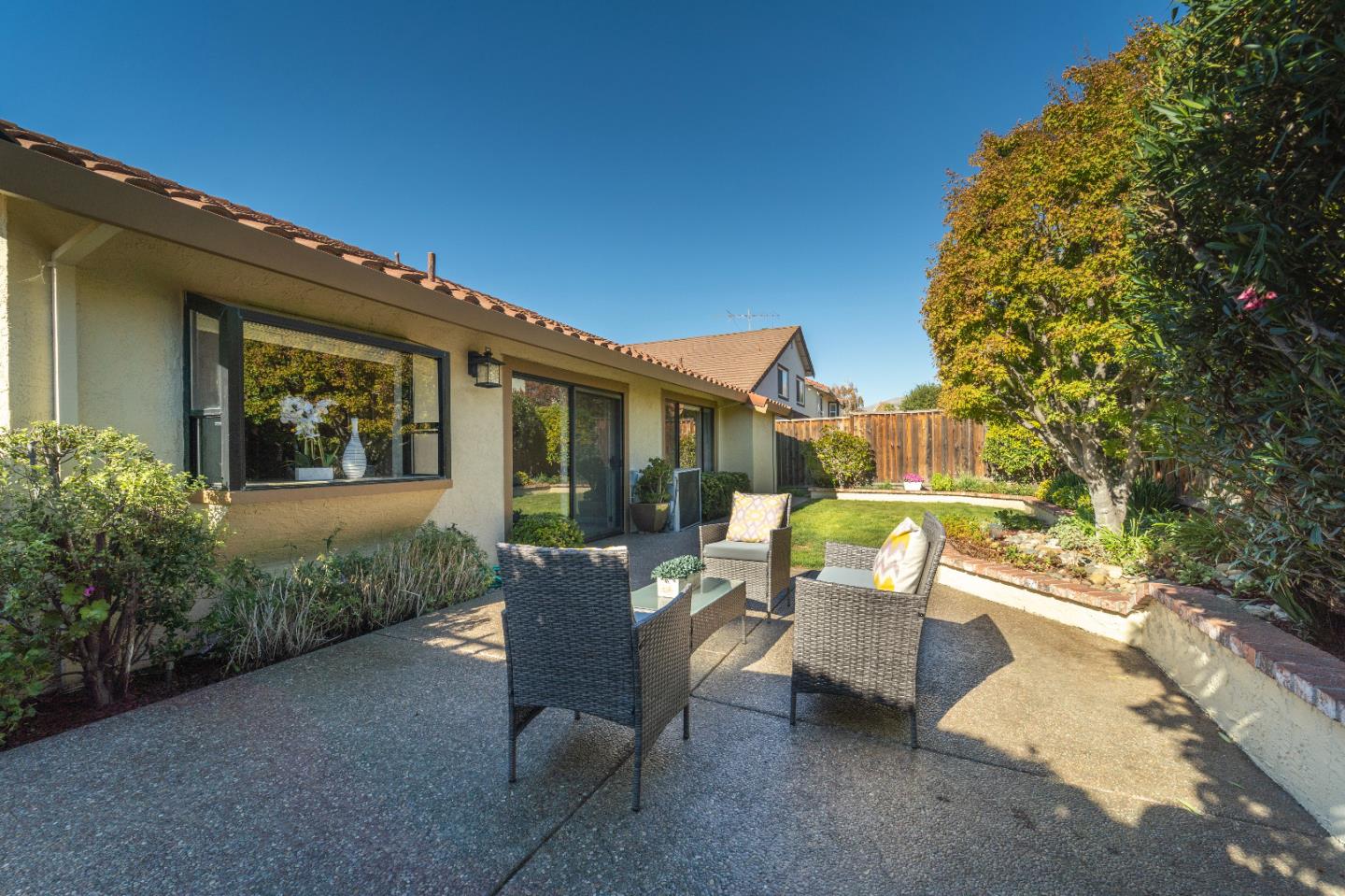 808 Hamilton Avenue Milpitas, CA 95035 - Photo 31 of 41 a view of a patio with table and chairs and potted plants
