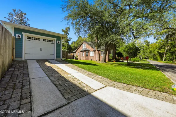 a front view of a house with yard