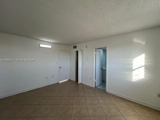 8075 Northwest 7th Street, Unit 501 Miami, FL 33126 - Photo 18 of 28 a view of an empty room and window