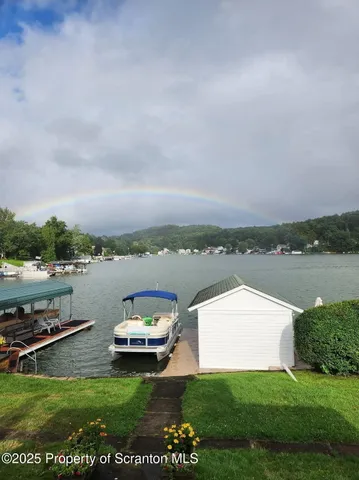 a view of a lake with a big yard