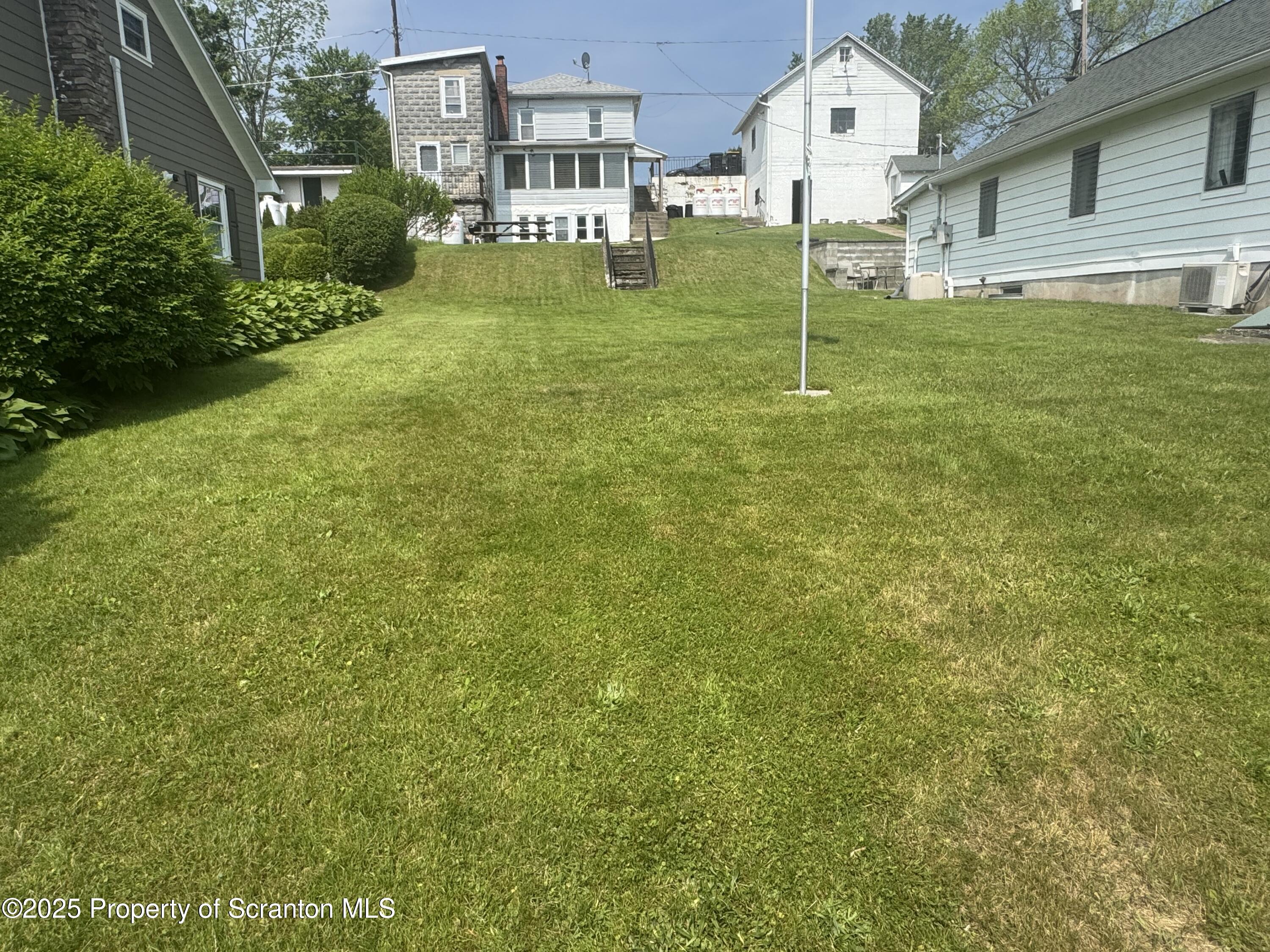 464 Point Road Lake Winola, PA 18419 - Photo 35 of 47 a house view with a garden space