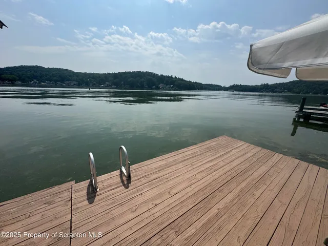 a view of outside space and a mountain view