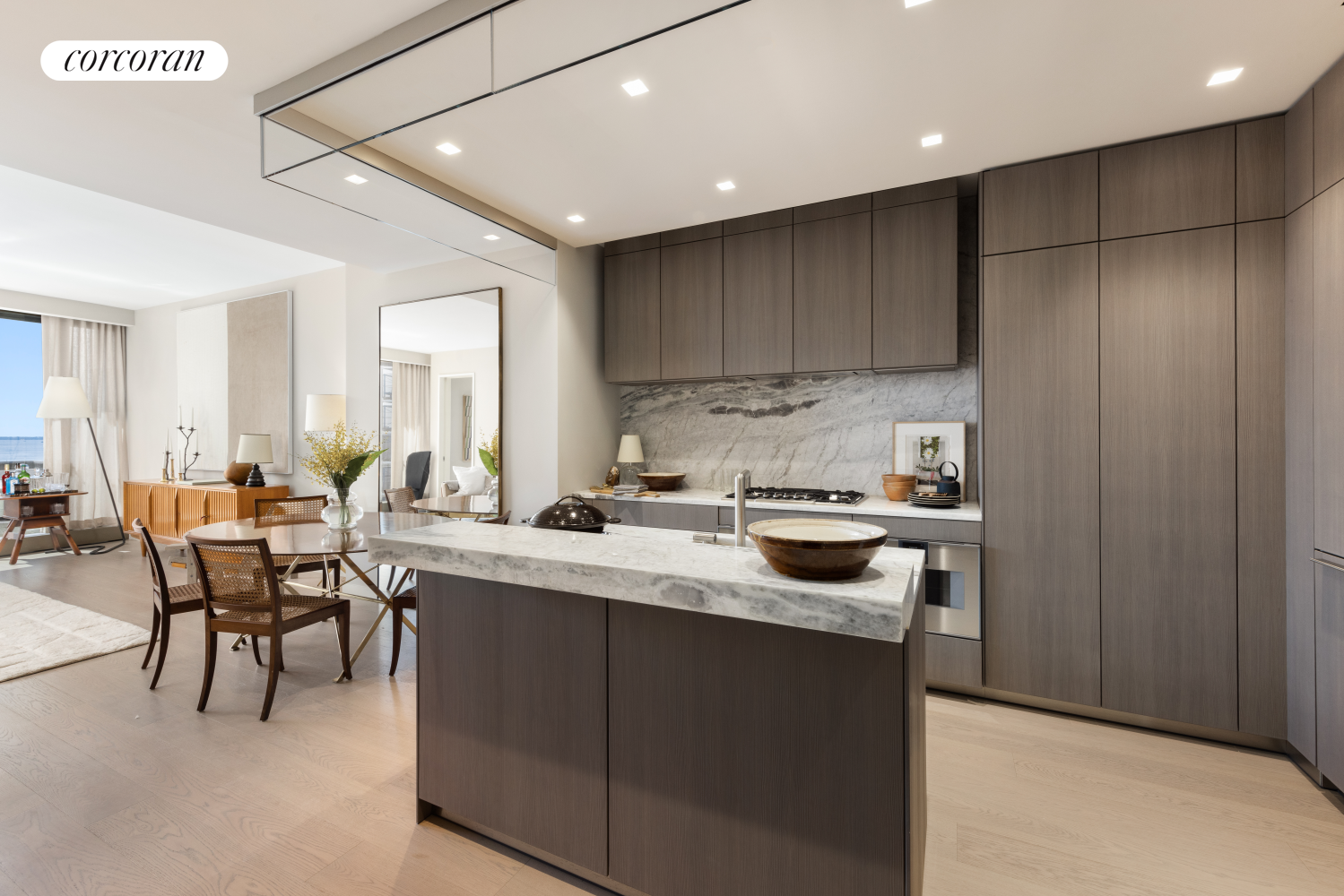 500 West 18th Street, Unit WEST 9F Manhattan, NY 10011 - Photo 3 of 14 a kitchen with a sink and cabinets