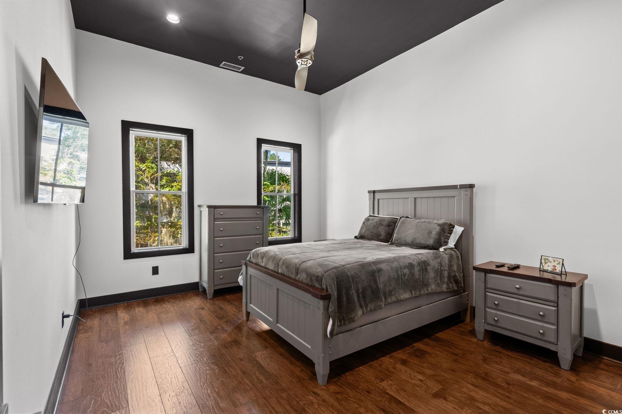 34 Shady Moss Loop, Unit 34 Murrells Inlet, SC 29576 - Photo 17 of 40 Bedroom with baseboards and dark wood finished floors
