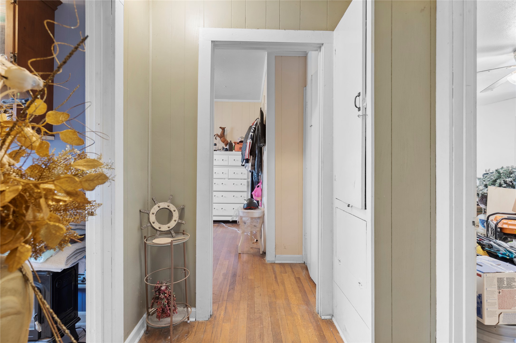 11281 Highway 150 Shepherd, TX 77371 - Photo 16 of 39 a view of a hallway with wooden floor and closet