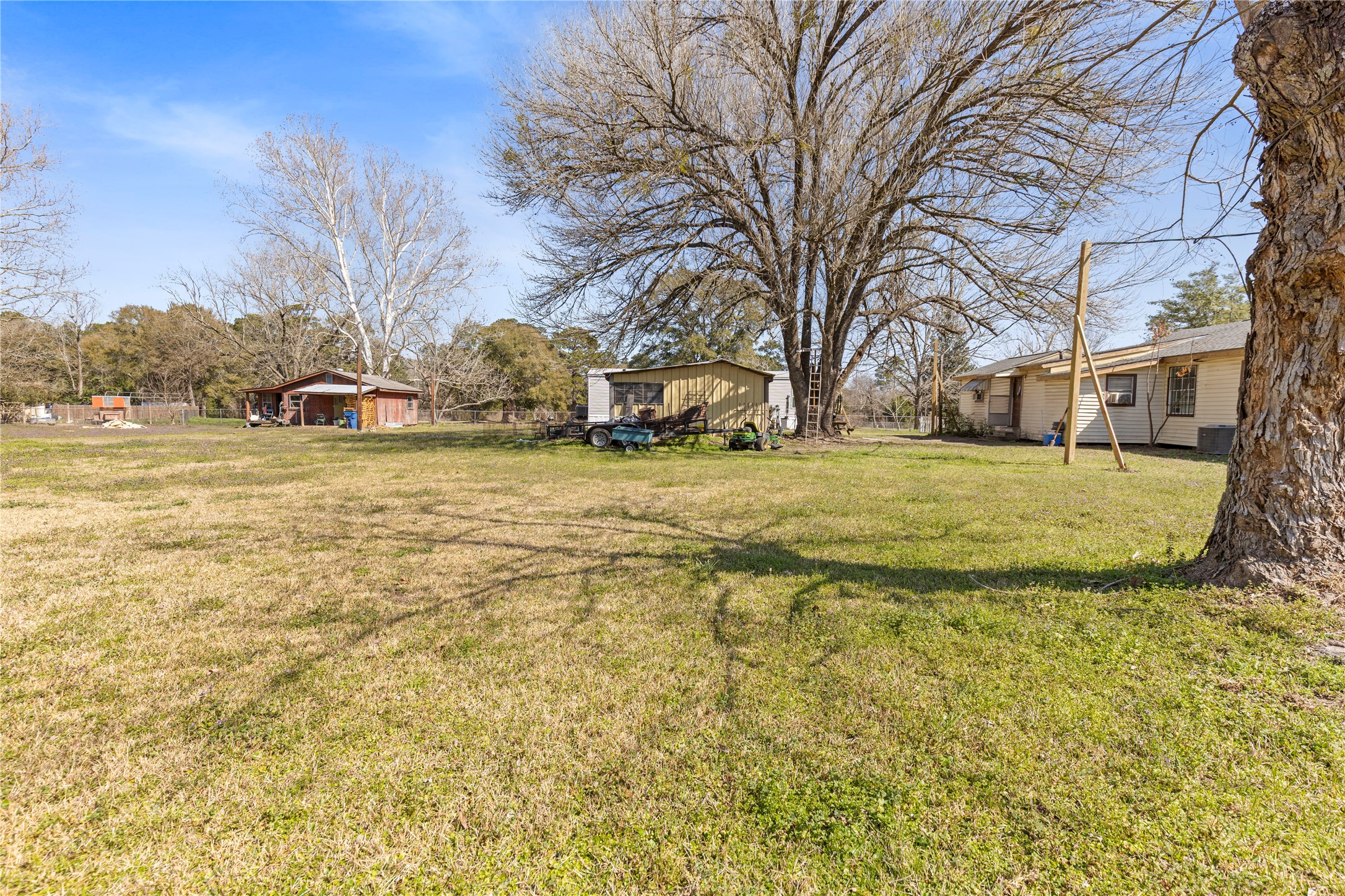 11281 Highway 150 Shepherd, TX 77371 - Photo 25 of 39 a view of a yard with a house