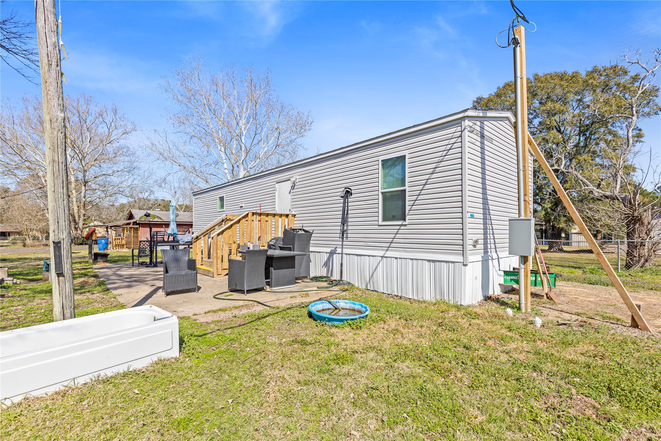11281 Highway 150 Shepherd, TX 77371 - Photo 28 of 39 a view of a backyard with a patio