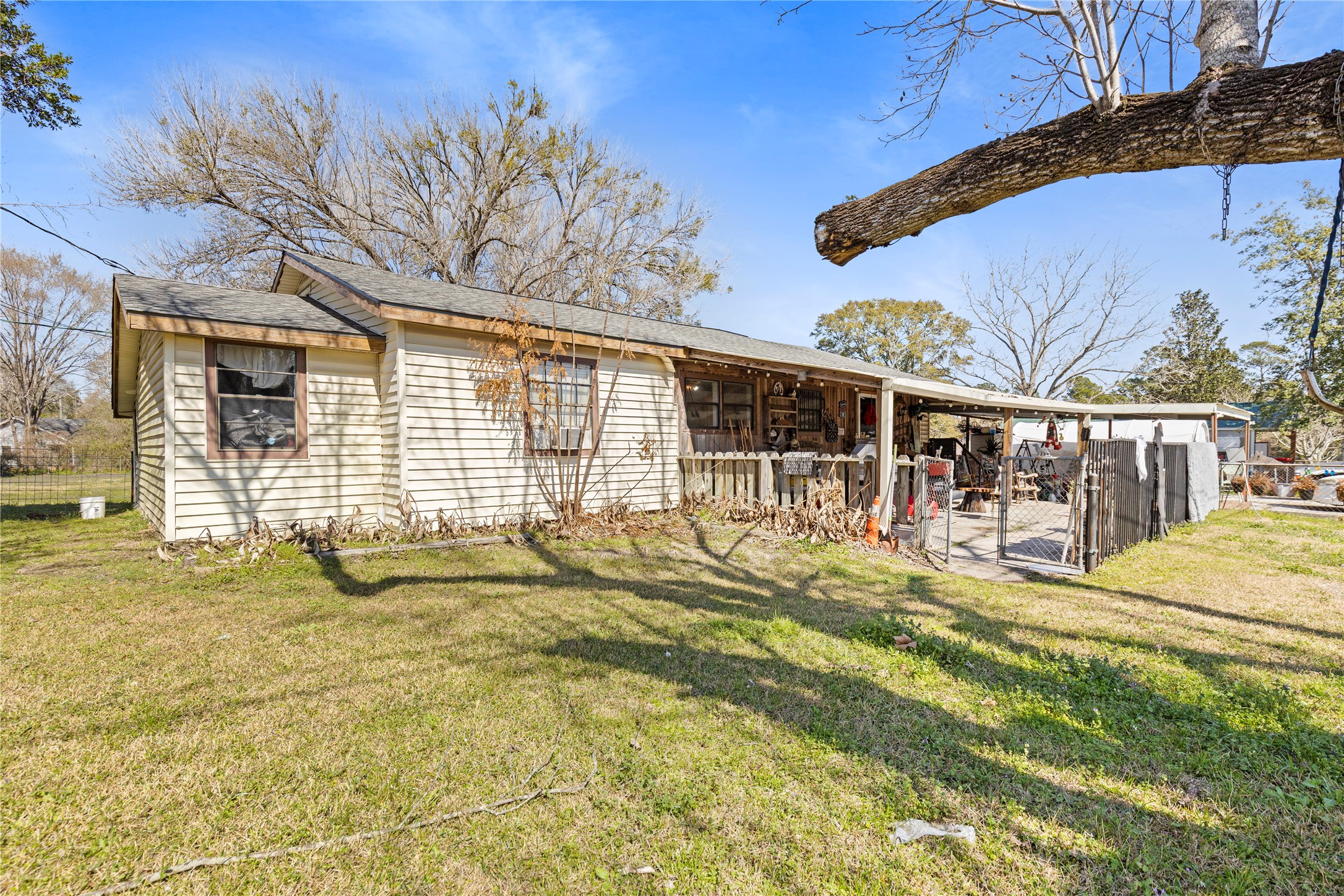 11281 Highway 150 Shepherd, TX 77371 - Photo 3 of 39 a view of a house with backyard and sitting area