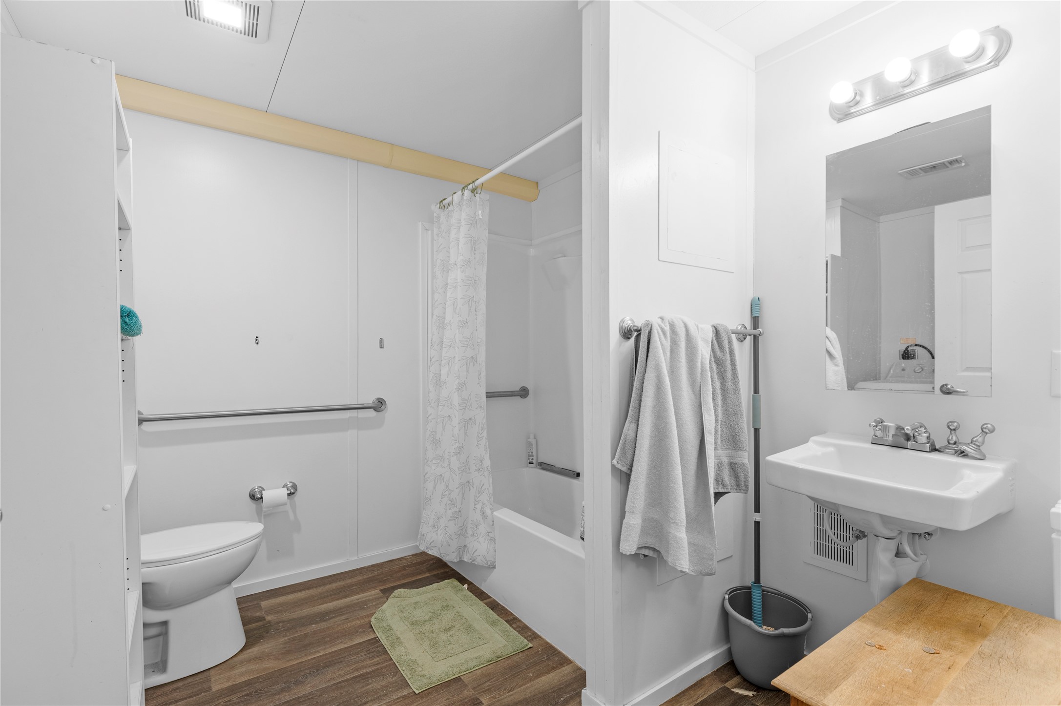 11281 Highway 150 Shepherd, TX 77371 - Photo 33 of 39 a bathroom with a sink toilet and shower