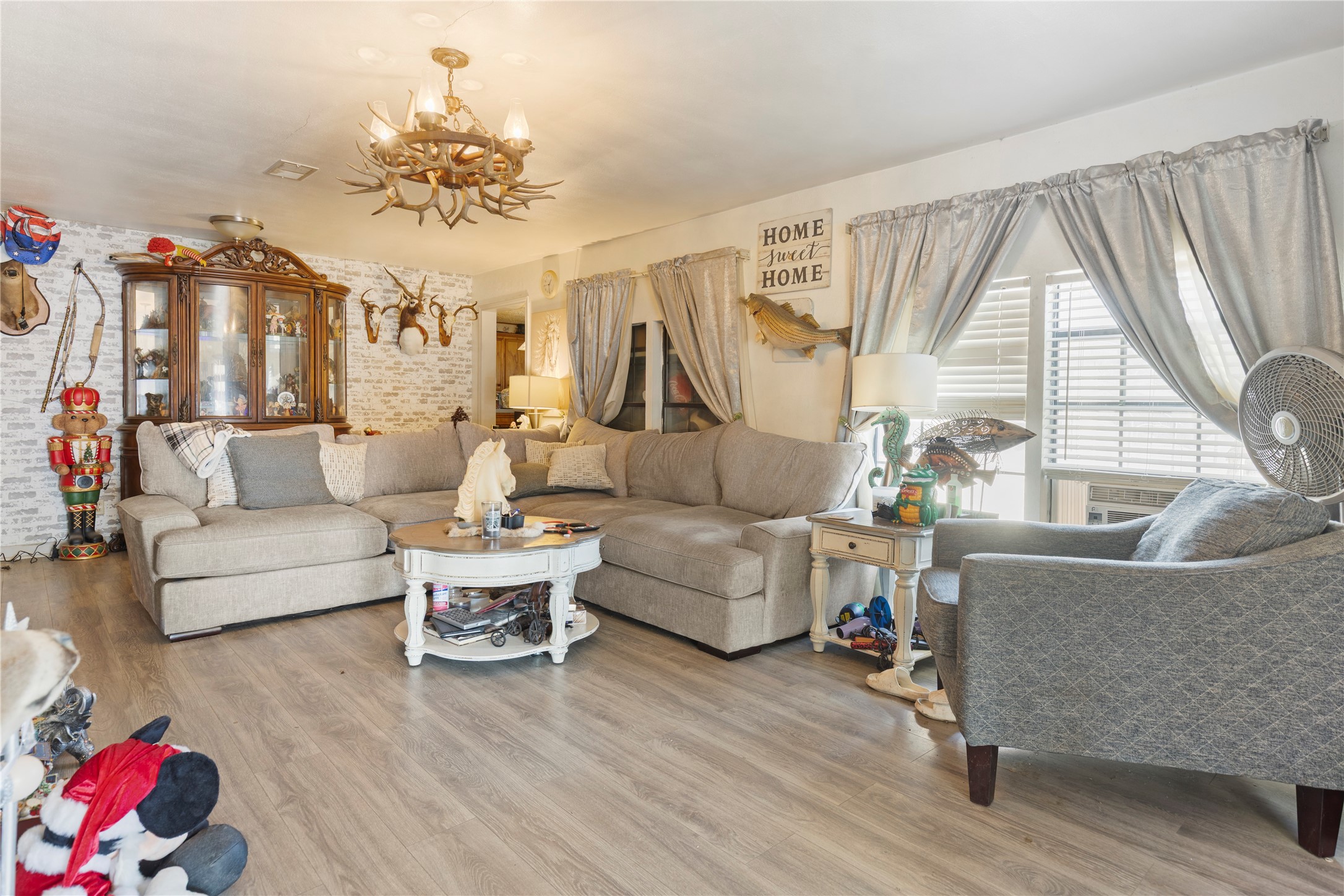 11281 Highway 150 Shepherd, TX 77371 - Photo 7 of 39 a living room with furniture and a large window