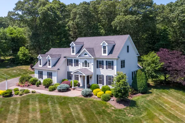 a aerial view of a house with swimming pool