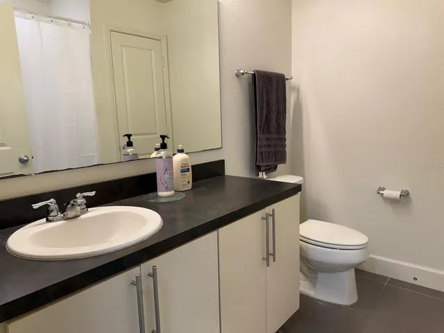 a bathroom with a sink and a toilet