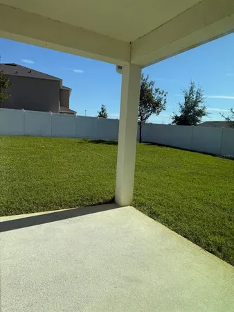 a view of a big room with a big yard