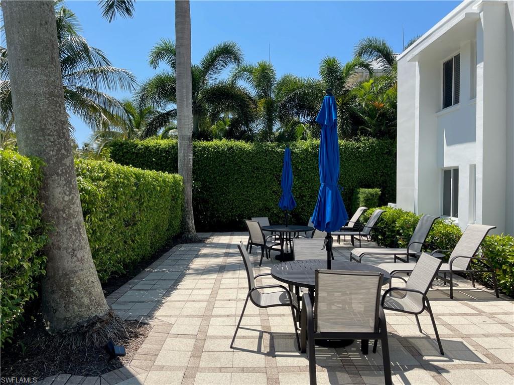 175 5th Avenue South, Unit 9 Naples, FL 34102 - Photo 12 of 19 a view of outdoor dining space with a patio