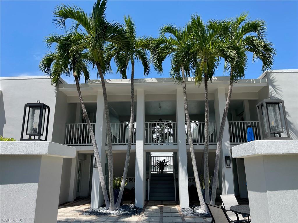 175 5th Avenue South, Unit 9 Naples, FL 34102 - Photo 13 of 19 a view of balcony and yard