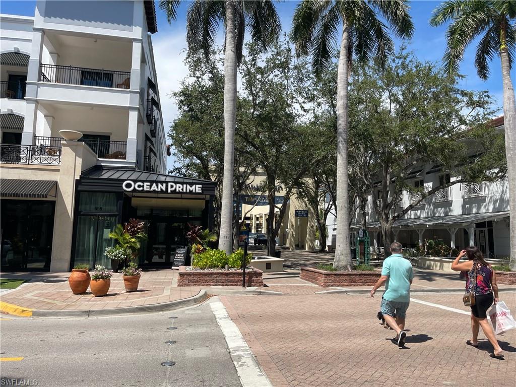 175 5th Avenue South, Unit 9 Naples, FL 34102 - Photo 19 of 19 a view of a building with sitting area