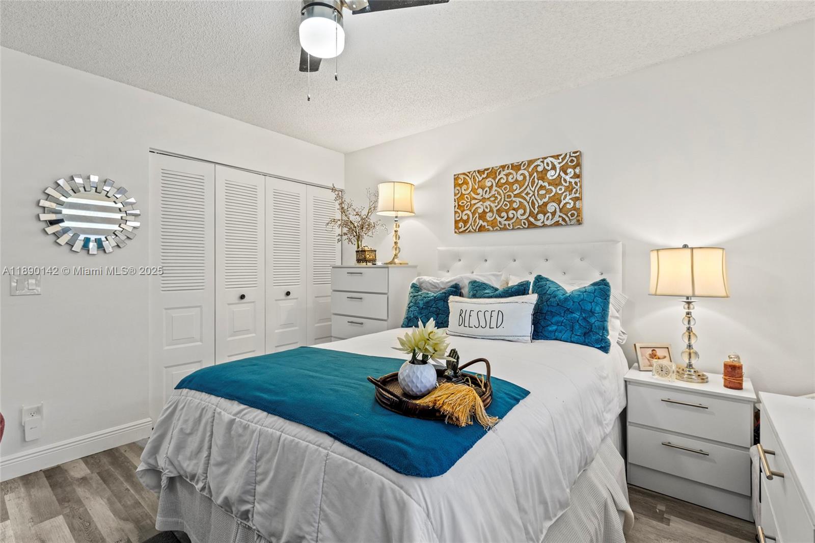 10400 Northwest 30th Court, Unit 202 Sunrise, FL 33322 - Photo 31 of 42 a bed room with a bed and furniture