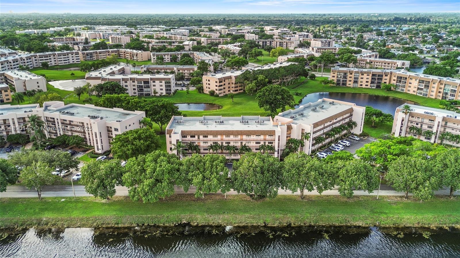 10400 Northwest 30th Court, Unit 202 Sunrise, FL 33322 - Photo 32 of 42 a view of a city with a lake view