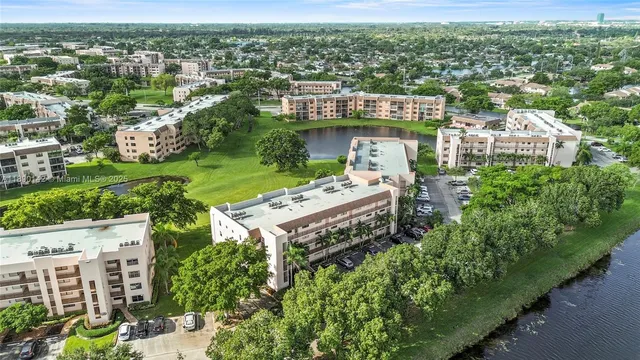 an aerial view of a house with a garden