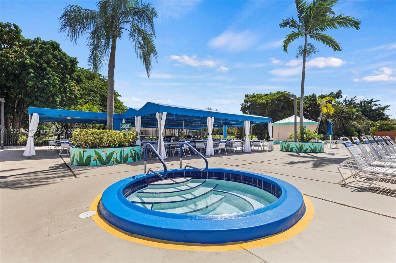 10400 Northwest 30th Court, Unit 202 Sunrise, FL 33322 - Photo 36 of 42 a view of a swimming pool with a patio