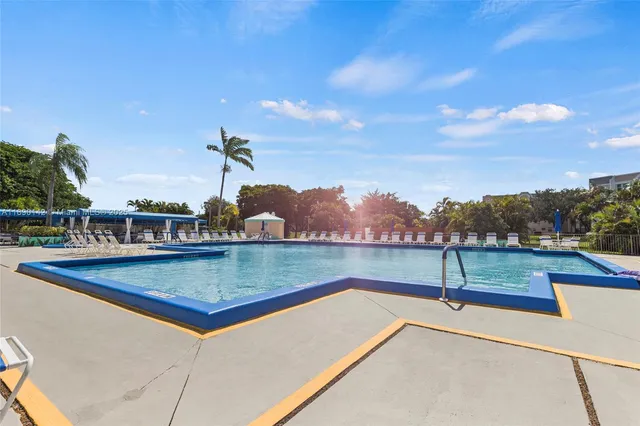 a view of a swimming pool with a lake