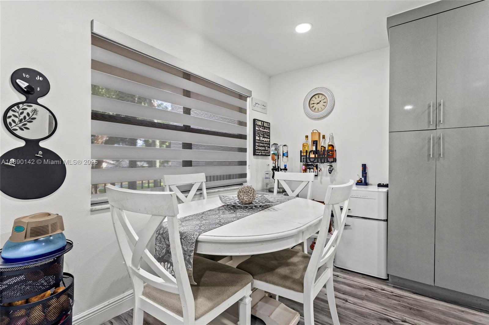 10400 Northwest 30th Court, Unit 202 Sunrise, FL 33322 - Photo 6 of 42 a table and chairs in a room