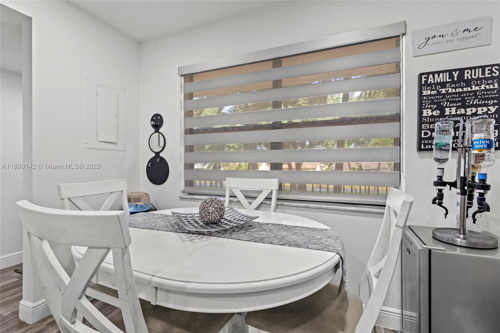 10400 Northwest 30th Court, Unit 202 Sunrise, FL 33322 - Photo 7 of 42 a dining room with table and chairs