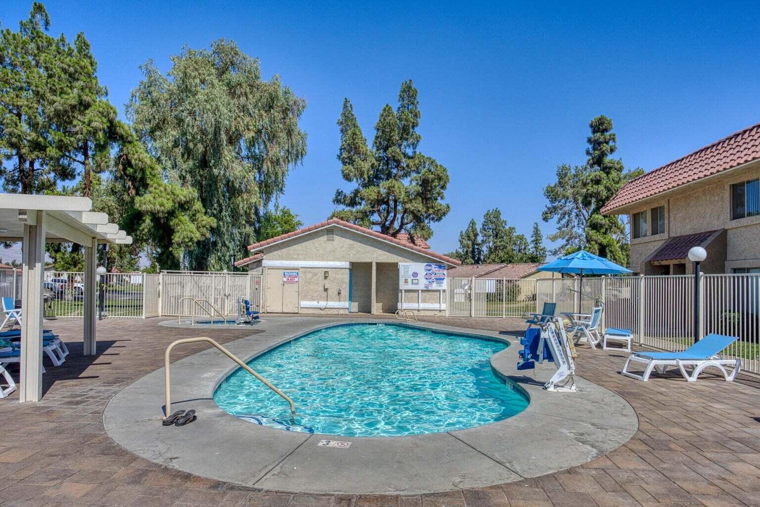 82567 Ave 48, Unit 44 Indio, CA 92201 - Photo 18 of 19 a house view with a garden space