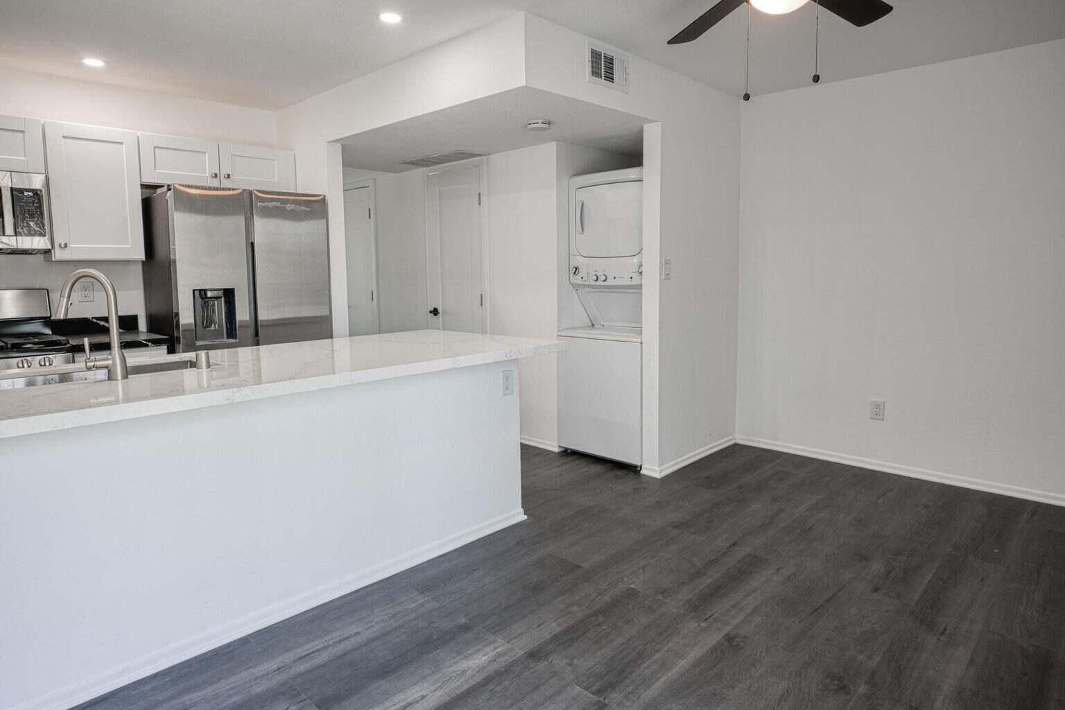 82567 Ave 48, Unit 44 Indio, CA 92201 - Photo 3 of 19 a view white cabinets and wooden floor