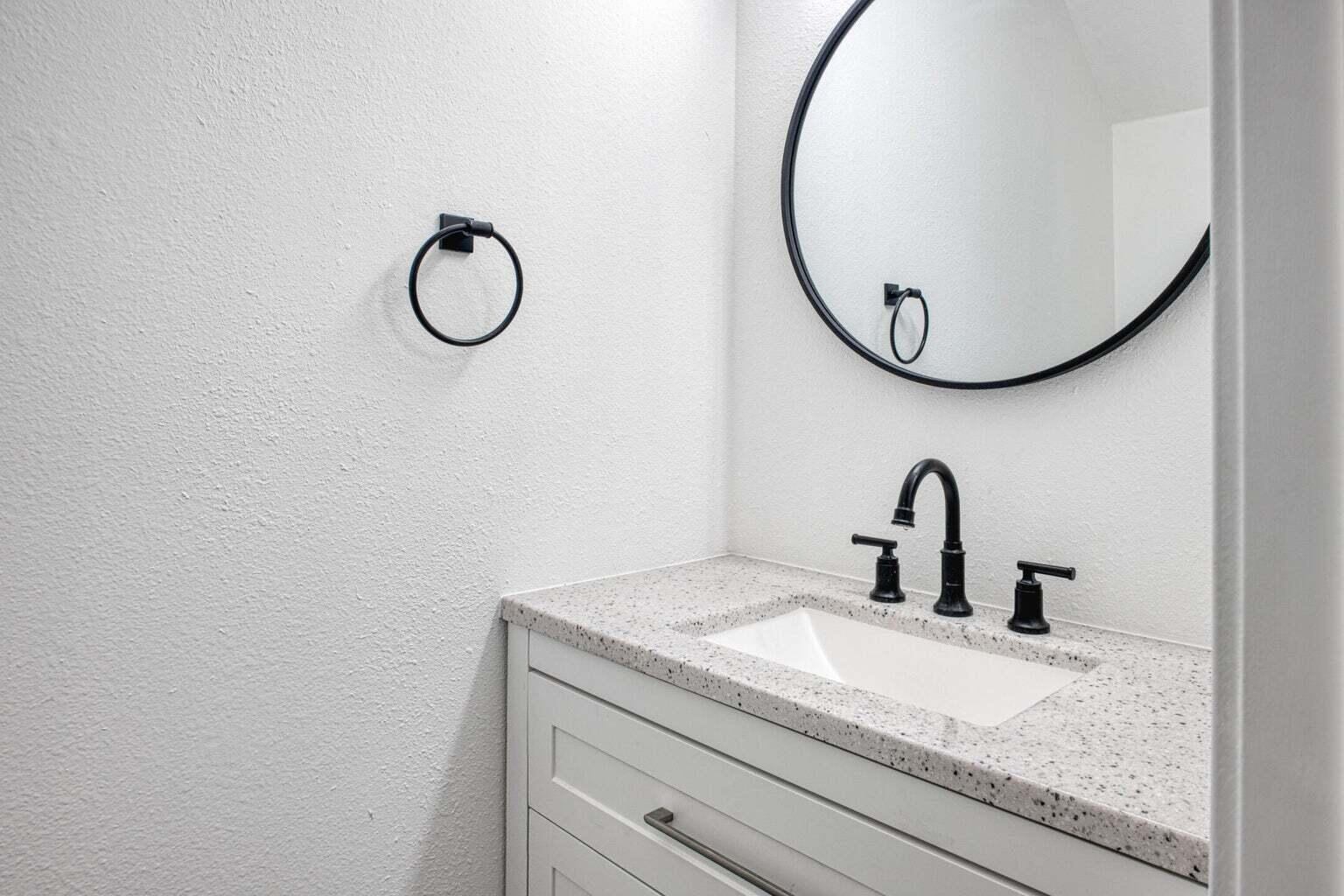 82567 Ave 48, Unit 44 Indio, CA 92201 - Photo 4 of 19 a bathroom with a sink and a mirror