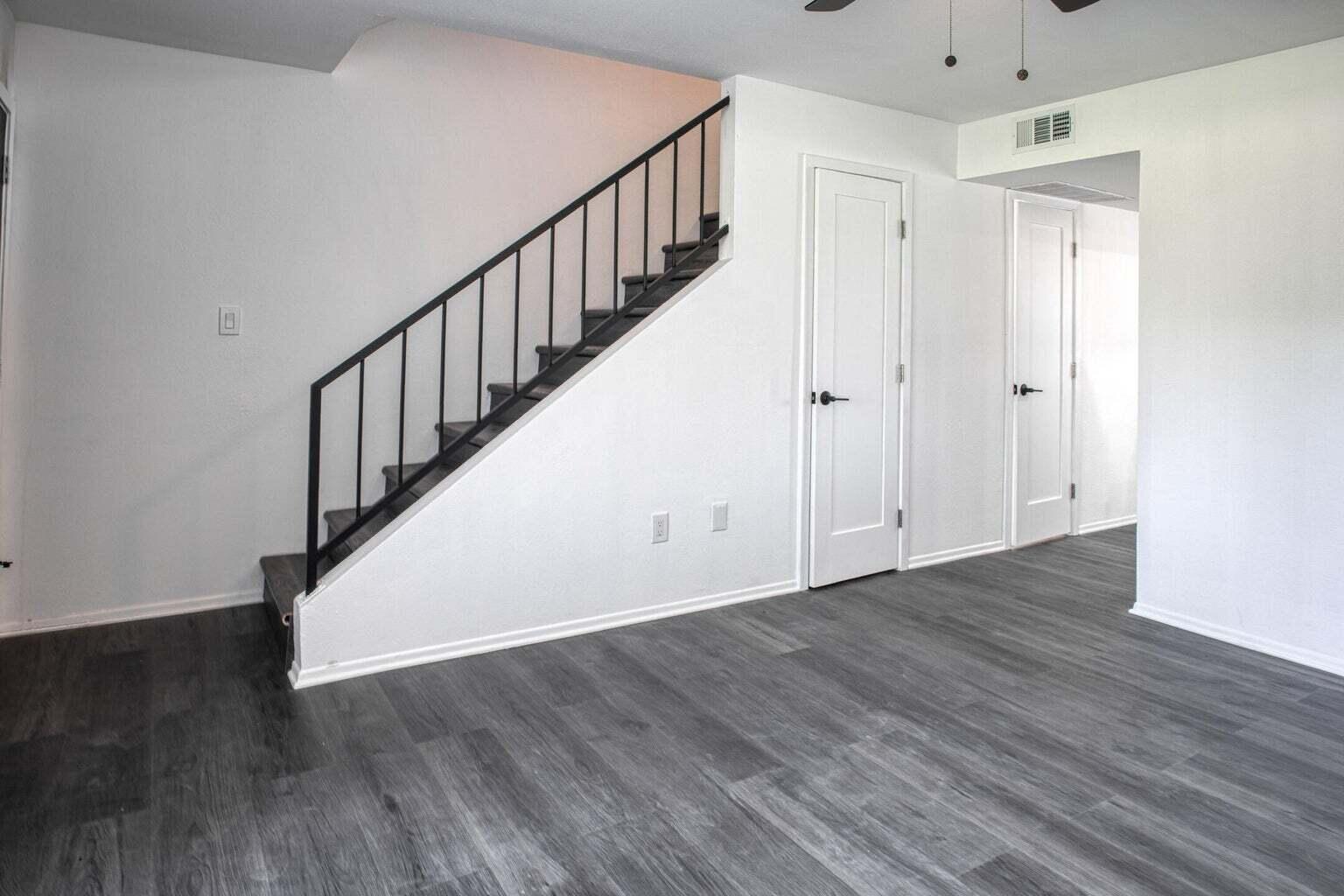 82567 Ave 48, Unit 44 Indio, CA 92201 - Photo 5 of 19 a view of a hallway with wooden floor and entryway
