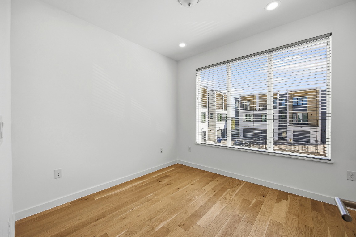 6020 Springdale Road, Unit 12 Austin, TX 78723 - Photo 12 of 28 an empty room with a window