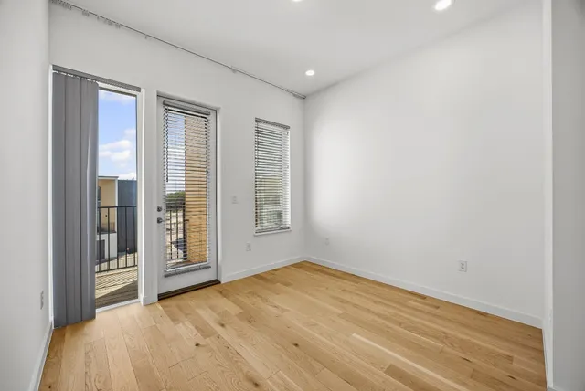 an empty room with windows