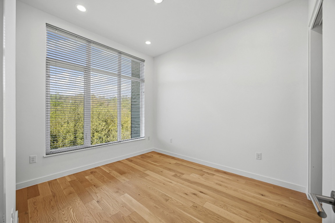 6020 Springdale Road, Unit 12 Austin, TX 78723 - Photo 18 of 28 an empty room with a window
