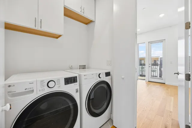 a view of livingroom with washer and dryer