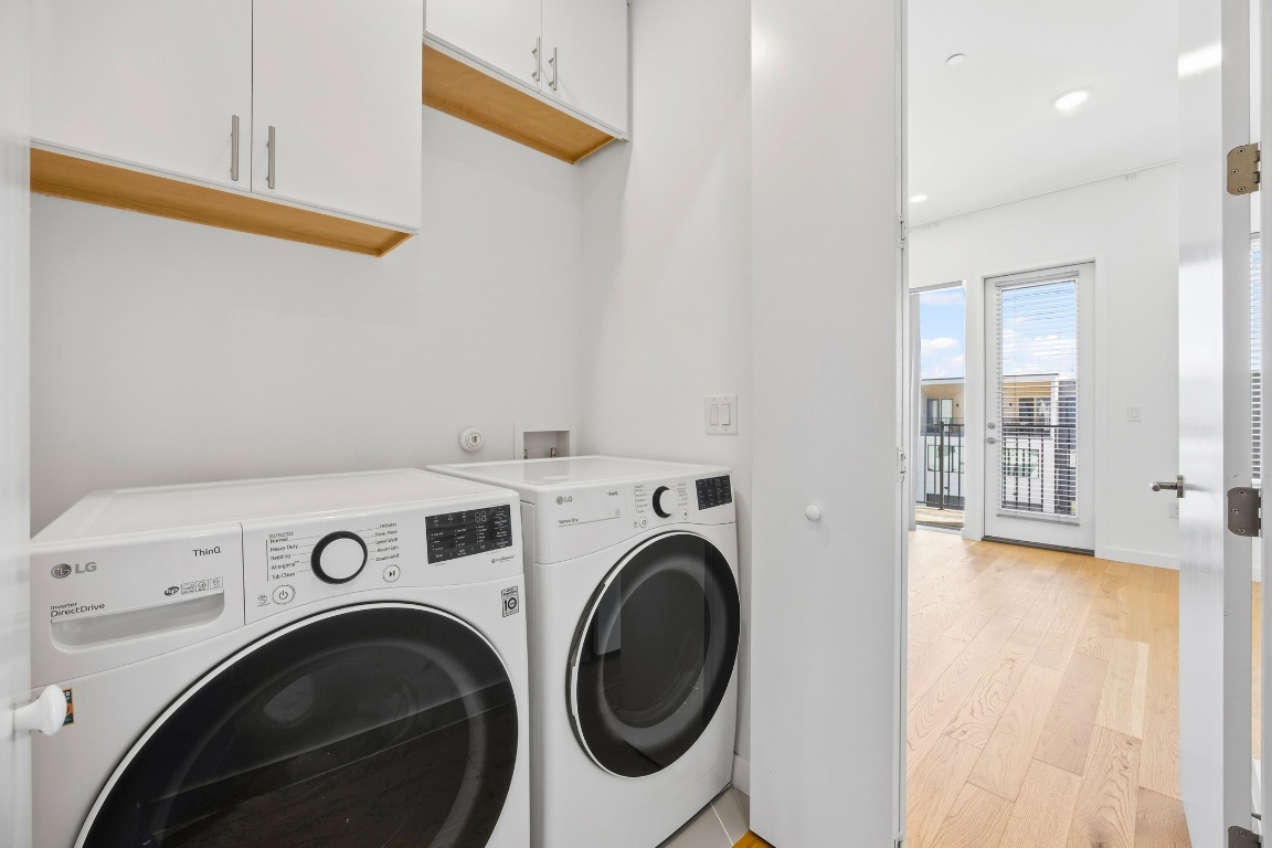 6020 Springdale Road, Unit 12 Austin, TX 78723 - Photo 20 of 28 a view of livingroom with washer and dryer